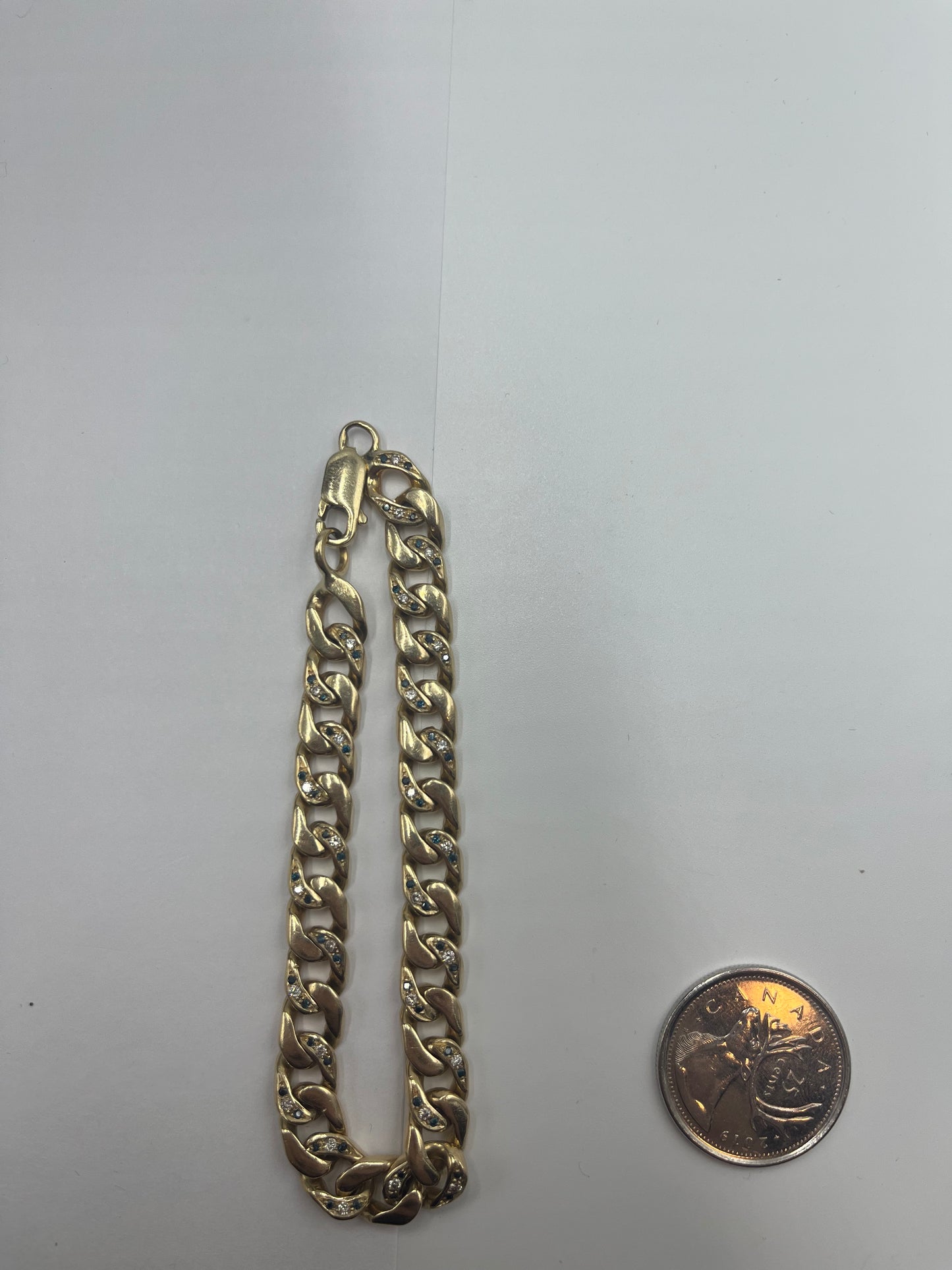 10 karat gold and diamond cuban link bracelet