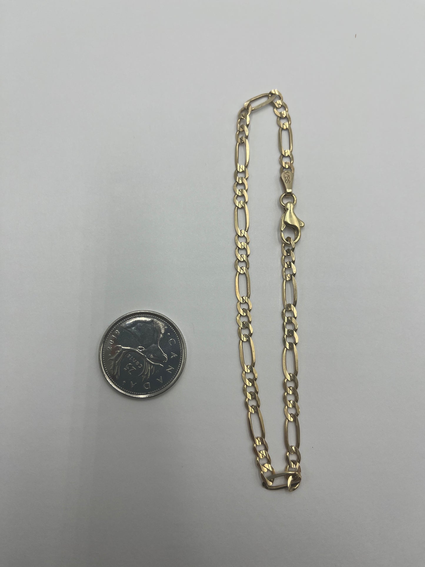 10 karat gold Figaro bracelet