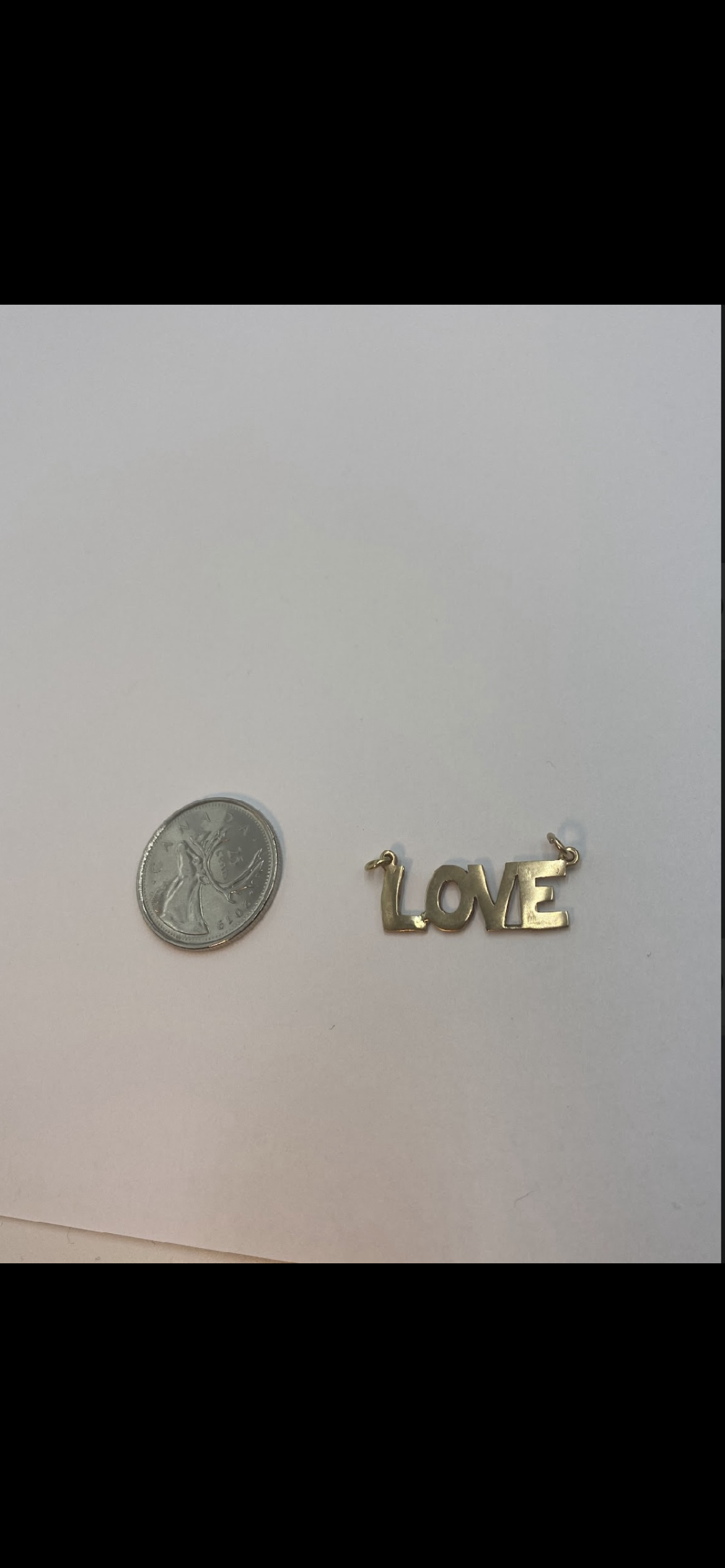 10 karat gold “LOVE” Pendant